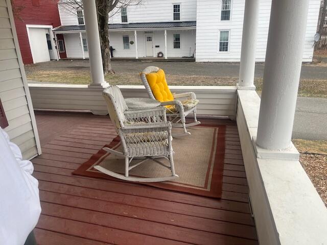 wooden deck featuring a porch