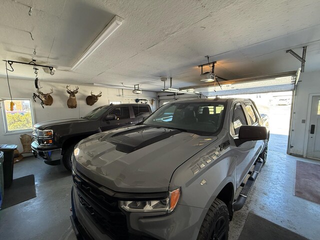 182 E Main St, Fort Kent, ME 04743 - garage featuring a garage door opener