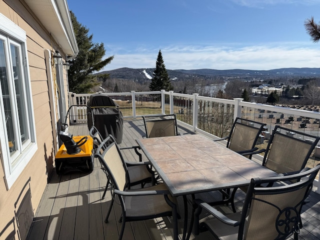 182 E Main St, Fort Kent, ME 04743 - deck with a mountain view and outdoor dining area