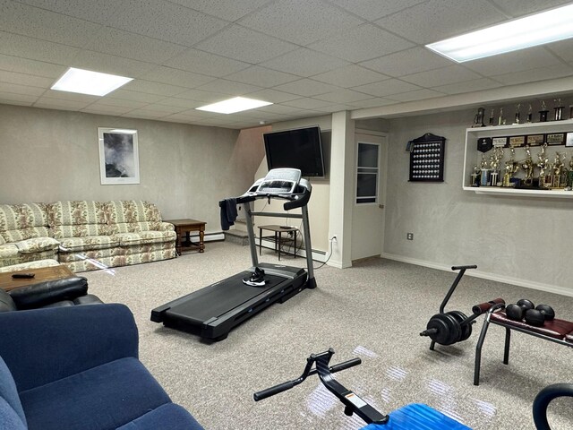 182 E Main St, Fort Kent, ME 04743 - workout room featuring carpet floors, a baseboard heating unit, a paneled ceiling, and baseboards