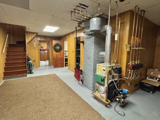 182 E Main St, Fort Kent, ME 04743 - finished below grade area with wooden walls, stairway, and a drop ceiling