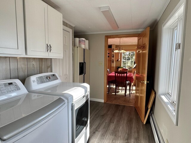 182 E Main St, Fort Kent, ME 04743 - laundry area featuring separate washer and dryer, cabinet space, a chandelier, dark wood-style flooring, and crown molding