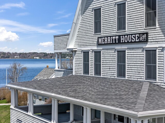6 Merritt House Rd Unit 20, Harpswell, ME 04066 - view of side of property featuring a water view and roof with shingles