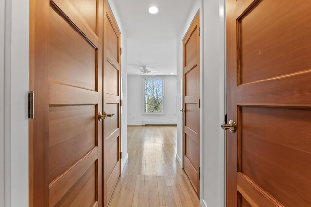 6 Merritt House Rd Unit 20, Harpswell, ME 04066 - corridor featuring light wood-type flooring, recessed lighting, baseboards, and baseboard heating