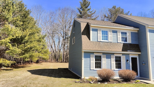 54 Black Smith Rd Unit 13, Wells, ME 04090 - view of front of house featuring a shingled roof and a gambrel roof
