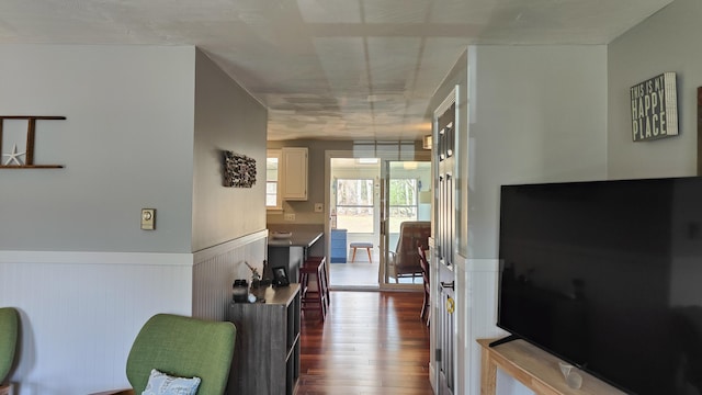 54 Black Smith Rd Unit 13, Wells, ME 04090 - corridor featuring dark wood-type flooring and a wainscoted wall