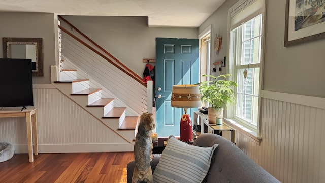 54 Black Smith Rd Unit 13, Wells, ME 04090 - entrance foyer featuring wainscoting, a wealth of natural light, wood finished floors, and stairway
