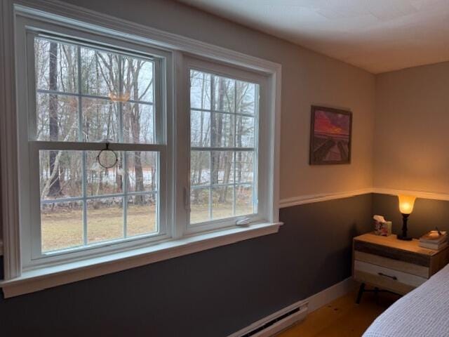 54 Black Smith Rd Unit 13, Wells, ME 04090 - bedroom with baseboards and wood finished floors