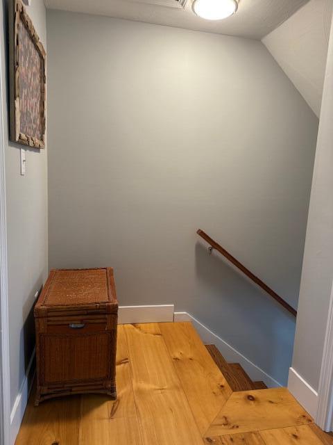 54 Black Smith Rd Unit 13, Wells, ME 04090 - stairs featuring wood finished floors and lofted ceiling