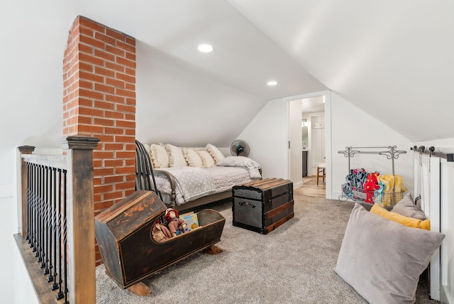 carpeted bedroom featuring recessed lighting and vaulted ceiling