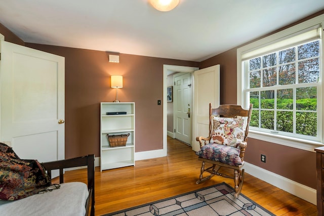 9 Phillips Rd, Falmouth, ME 04105 - sitting room featuring healthy amount of natural light, baseboards, and light wood-type flooring