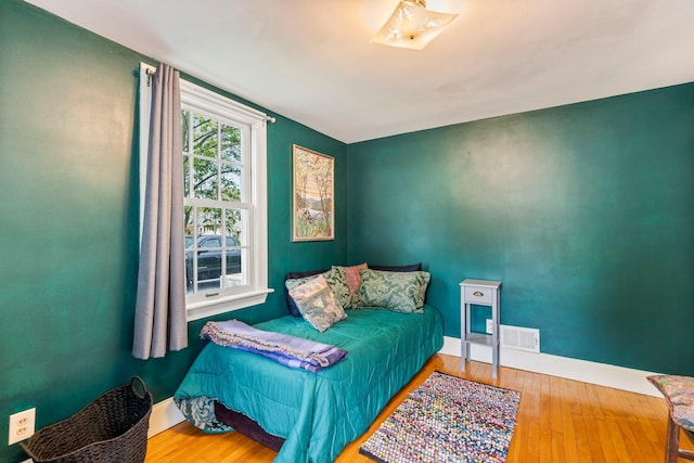 9 Phillips Rd, Falmouth, ME 04105 - bedroom featuring wood-type flooring and baseboards