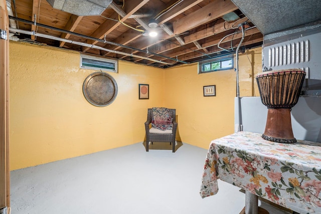 9 Phillips Rd, Falmouth, ME 04105 - bedroom with concrete floors and a textured wall
