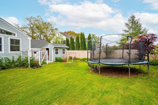 9 Phillips Rd, Falmouth, ME 04105 - view of yard featuring a trampoline and an outdoor structure