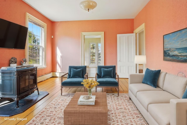 living area featuring hardwood / wood-style floors