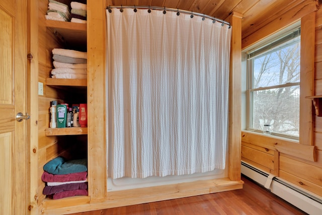 interior space with a baseboard heating unit