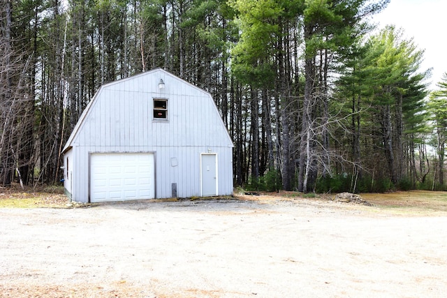 69 Goulds Ridge Rd, Passadumkeag, ME 04475 - detached garage with a wooded view