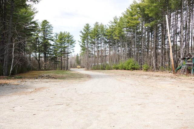 69 Goulds Ridge Rd, Passadumkeag, ME 04475 - view of road featuring a view of trees