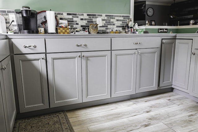 69 Goulds Ridge Rd, Passadumkeag, ME 04475 - kitchen featuring gray cabinetry, decorative backsplash, and light countertops