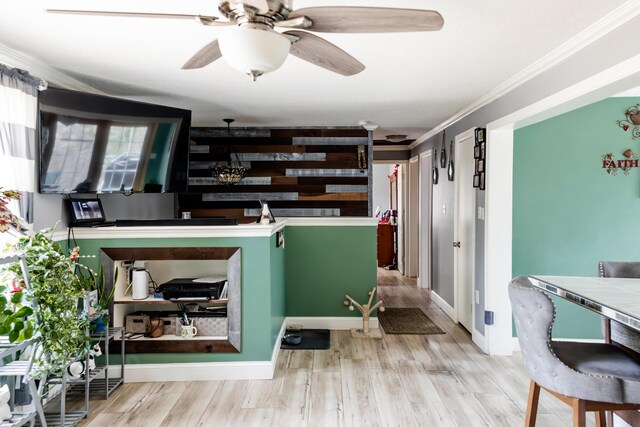 69 Goulds Ridge Rd, Passadumkeag, ME 04475 - kitchen featuring crown molding, wood finished floors, and ceiling fan