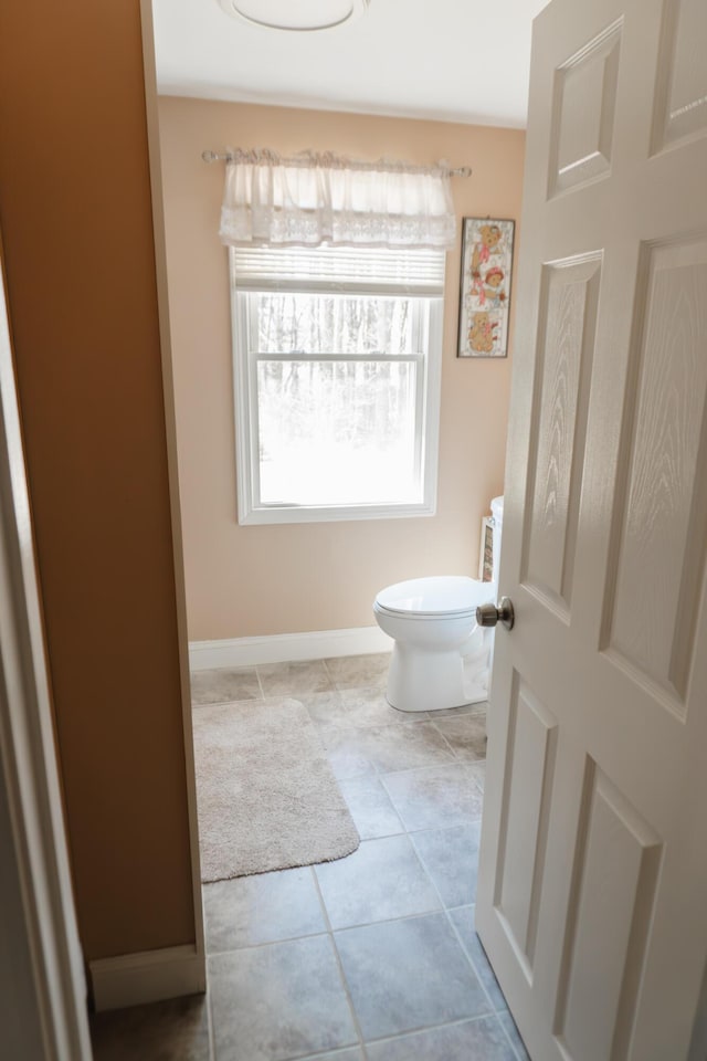 69 Goulds Ridge Rd, Passadumkeag, ME 04475 - bathroom with toilet and tile patterned floors