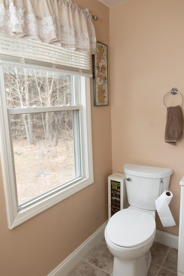 69 Goulds Ridge Rd, Passadumkeag, ME 04475 - bathroom with tile patterned floors, baseboards, and toilet