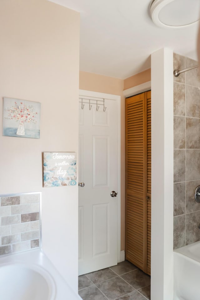 69 Goulds Ridge Rd, Passadumkeag, ME 04475 - full bath featuring a closet, tile patterned floors, and shower / bath combination