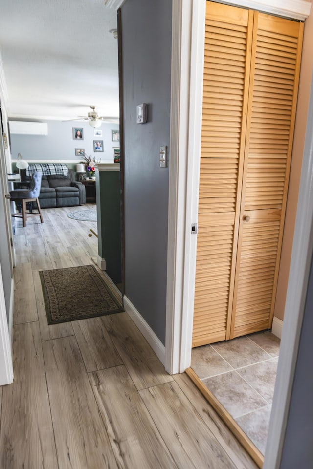 69 Goulds Ridge Rd, Passadumkeag, ME 04475 - corridor featuring light wood finished floors and baseboards