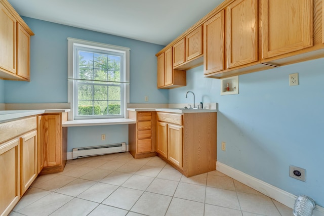 30 Apple Hill Vw, Alfred, ME 04002 - kitchen with baseboard heating, light countertops, light tile patterned floors, and a sink