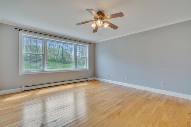 30 Apple Hill Vw, Alfred, ME 04002 - spare room with baseboard heating, crown molding, wood finished floors, baseboards, and a ceiling fan