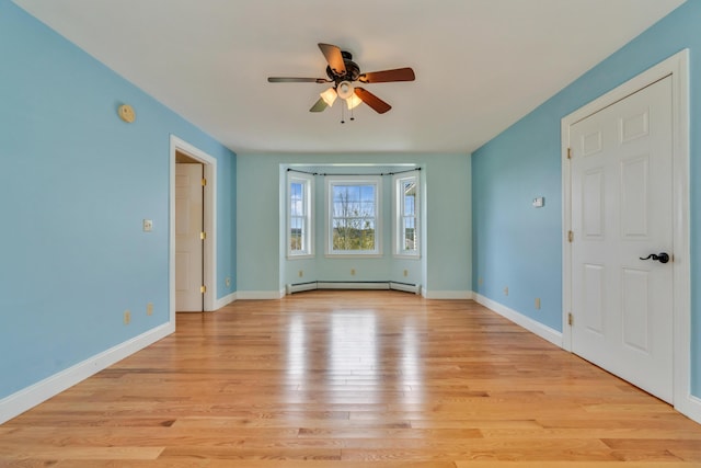 30 Apple Hill Vw, Alfred, ME 04002 - unfurnished room featuring baseboard heating, ceiling fan, light wood-style flooring, and baseboards