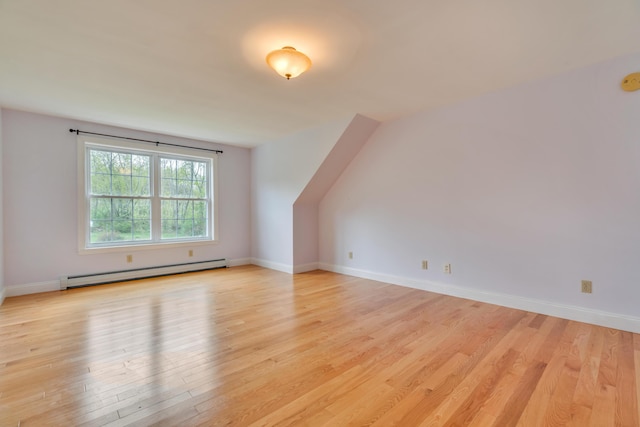 30 Apple Hill Vw, Alfred, ME 04002 - bonus room with a baseboard heating unit, light wood-type flooring, and baseboards