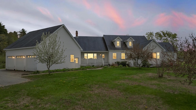 30 Apple Hill Vw, Alfred, ME 04002 - view of front of house featuring concrete driveway, an attached garage, a yard, and a chimney