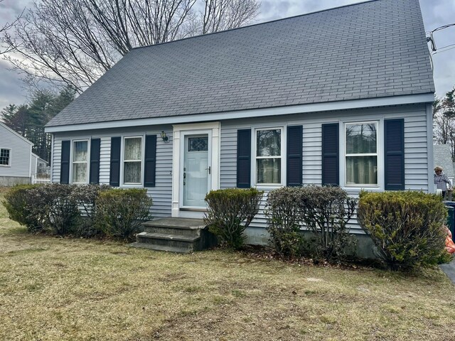 17 Greenfield Ln, Biddeford, ME 04005 - view of front of property featuring roof with shingles and a front lawn