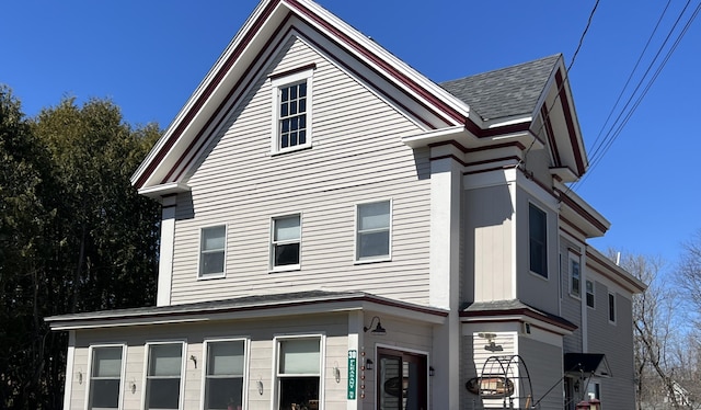 30 Pleasant St, Houlton, ME 04730 - view of home's exterior with a shingled roof