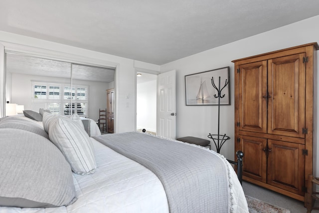 bedroom with light carpet