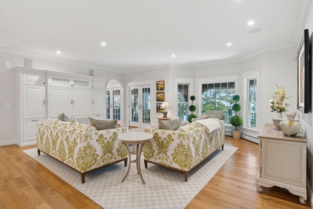 184 Spruce Point Rd, Yarmouth, ME 04096 - living room with recessed lighting, french doors, arched walkways, light wood-style flooring, and baseboard heating