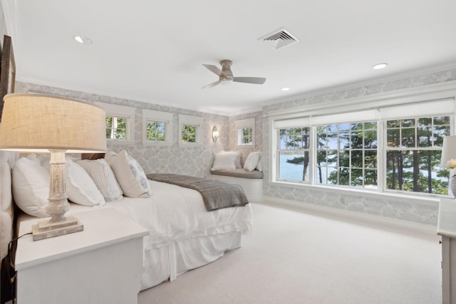 184 Spruce Point Rd, Yarmouth, ME 04096 - carpeted bedroom featuring crown molding, a ceiling fan, multiple windows, and visible vents