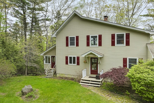 175 Quail Run Rd, Bristol, ME 04539 - view of front of property with a chimney and a front yard