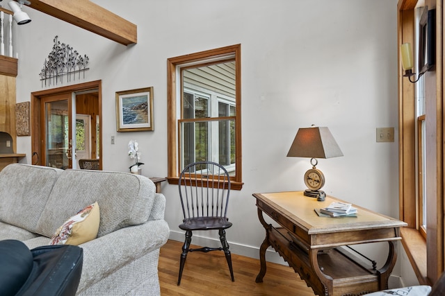 175 Quail Run Rd, Bristol, ME 04539 - living area featuring wood finished floors, baseboards, and beam ceiling