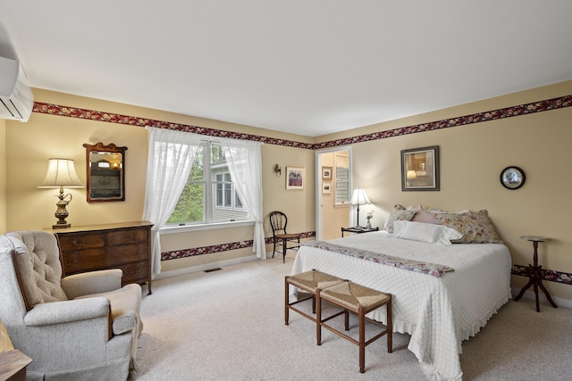 175 Quail Run Rd, Bristol, ME 04539 - bedroom with light carpet, baseboards, and a wall mounted AC