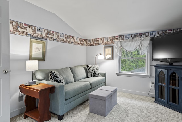 175 Quail Run Rd, Bristol, ME 04539 - living room featuring vaulted ceiling, baseboards, and carpet flooring