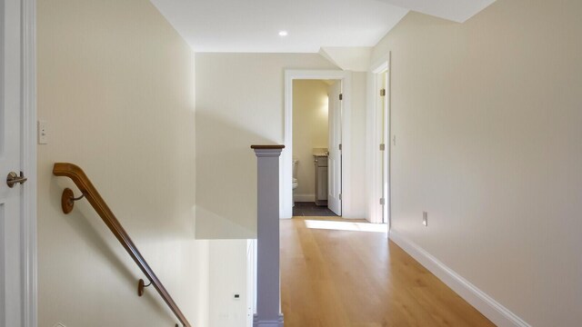 LOT16 Beech St Unit 16, Hallowell, ME 04347 - hall with light wood finished floors, baseboards, and an upstairs landing