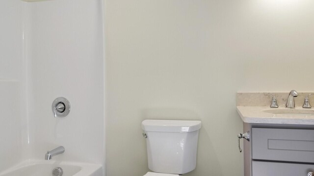 LOT16 Beech St Unit 16, Hallowell, ME 04347 - full bathroom featuring washtub / shower combination, toilet, and vanity