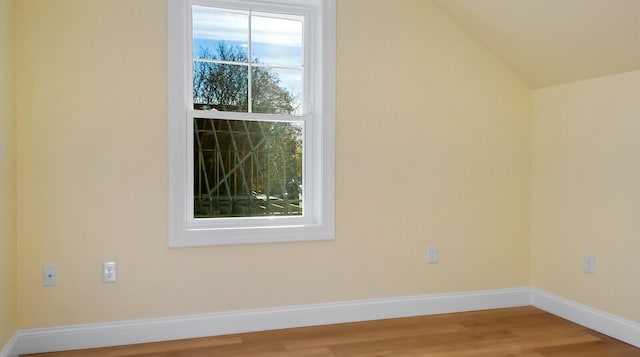 LOT16 Beech St Unit 16, Hallowell, ME 04347 - bonus room featuring baseboards, vaulted ceiling, and wood finished floors