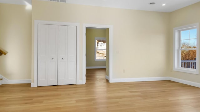 LOT16 Beech St Unit 16, Hallowell, ME 04347 - unfurnished bedroom with baseboards, light wood-style floors, visible vents, and a closet