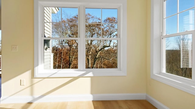 LOT16 Beech St Unit 16, Hallowell, ME 04347 - interior details featuring baseboards and wood finished floors