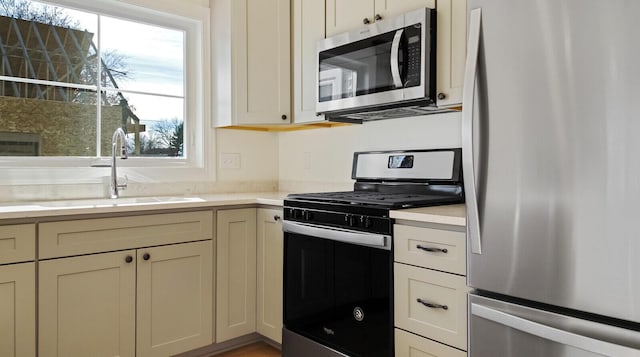 LOT16 Beech St Unit 16, Hallowell, ME 04347 - kitchen featuring light countertops, a sink, and appliances with stainless steel finishes