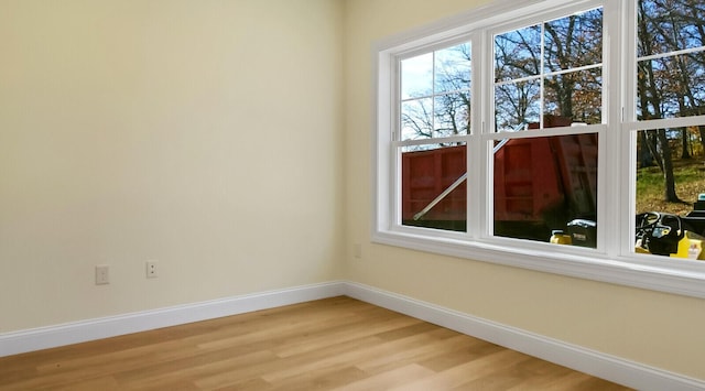 LOT16 Beech St Unit 16, Hallowell, ME 04347 - spare room with baseboards and light wood finished floors