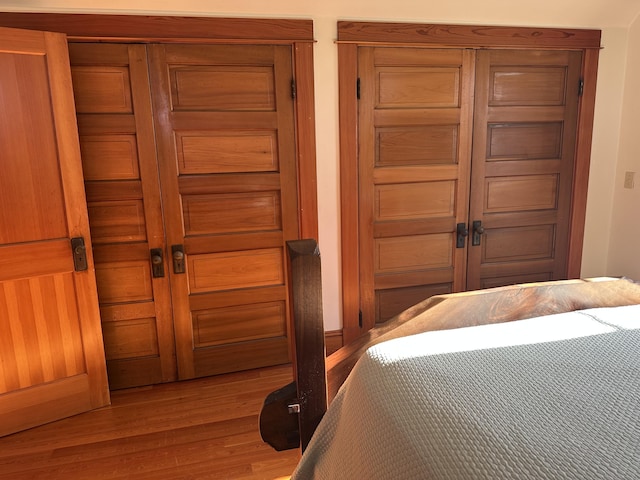 bedroom with light wood finished floors